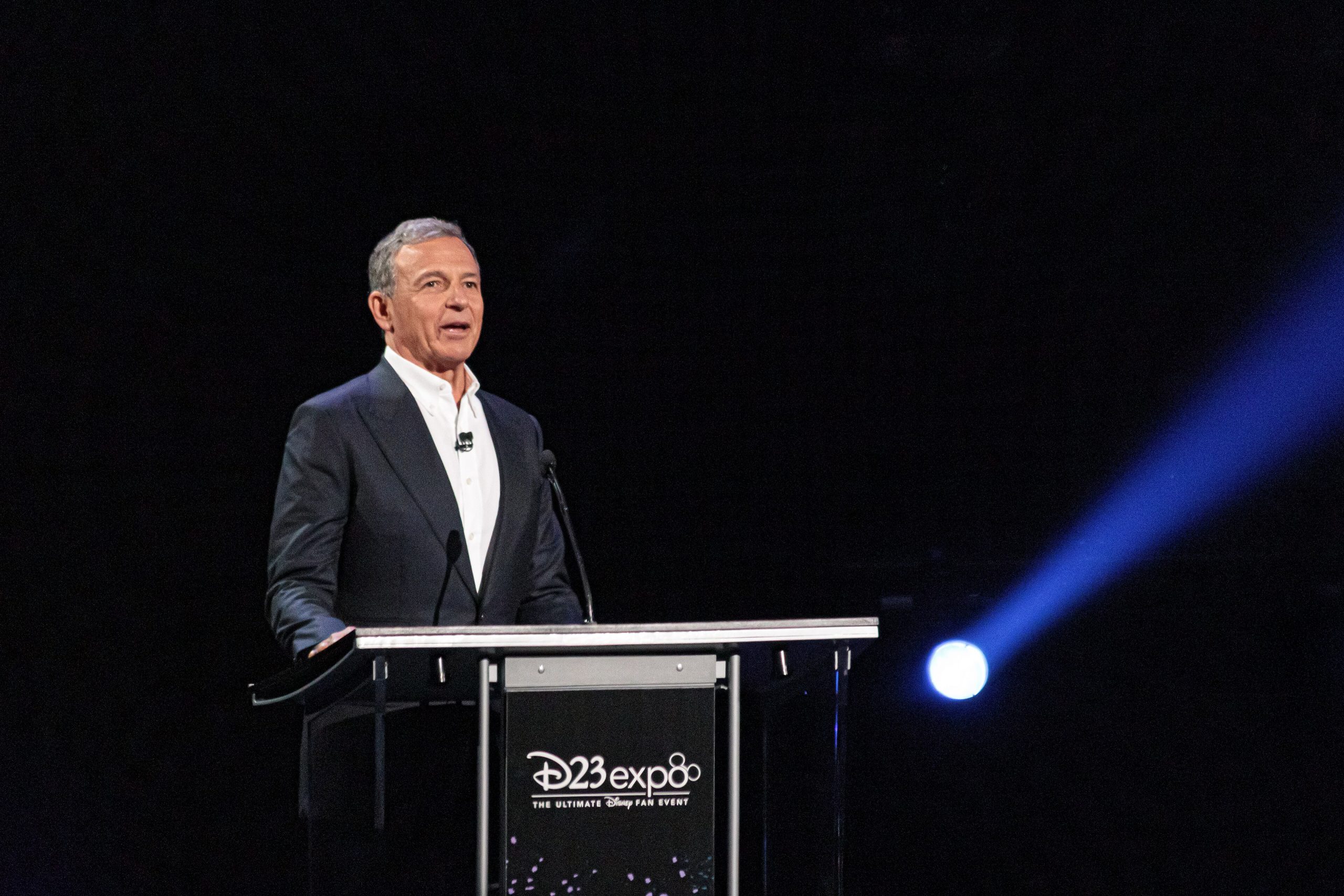 Bob Iger speaking at a podium at the D23 Expo Disney Legends Awards ceremony in 2019.