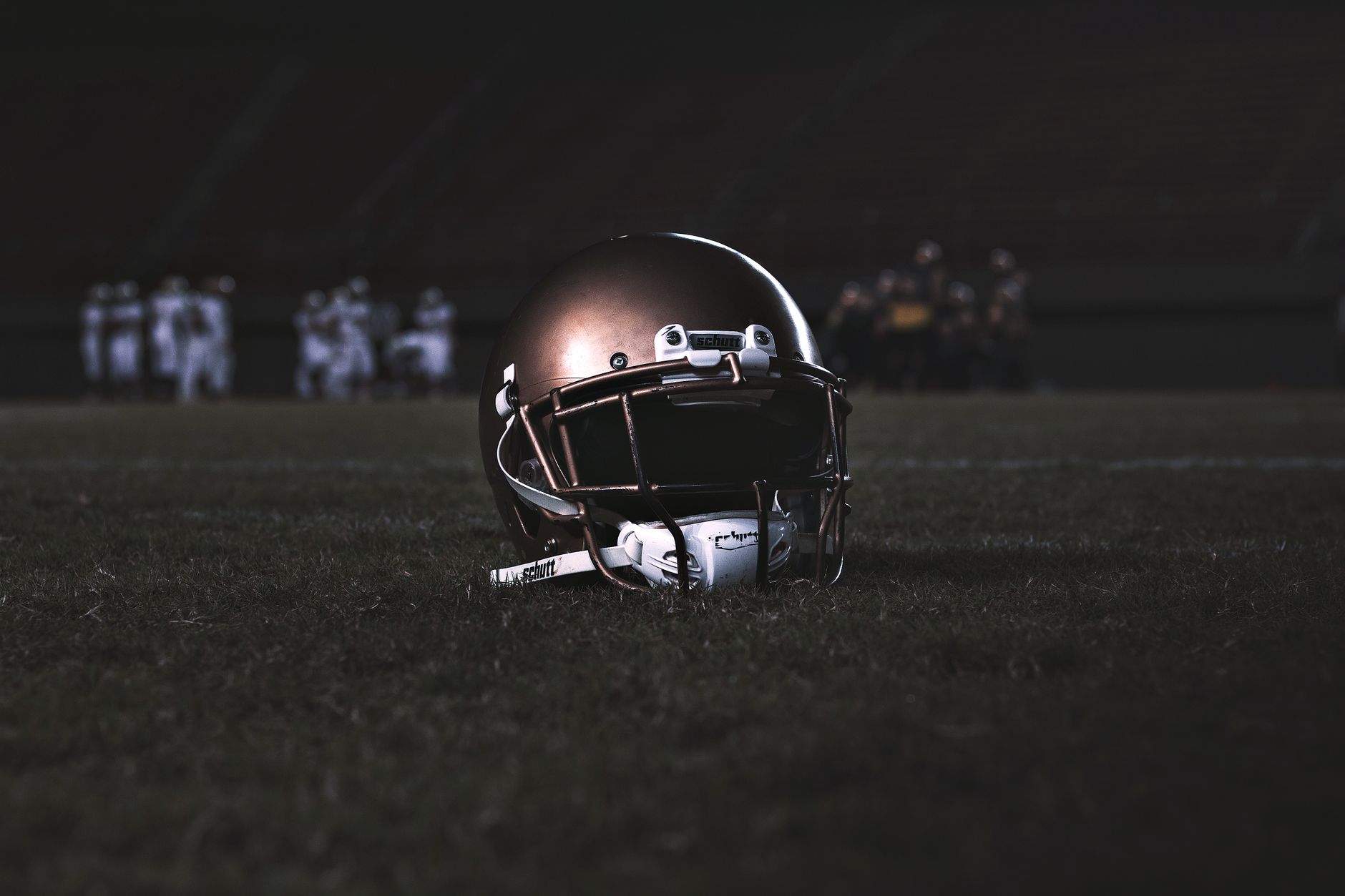A football helmet on a field, symbolizing the NFL disciplinary process