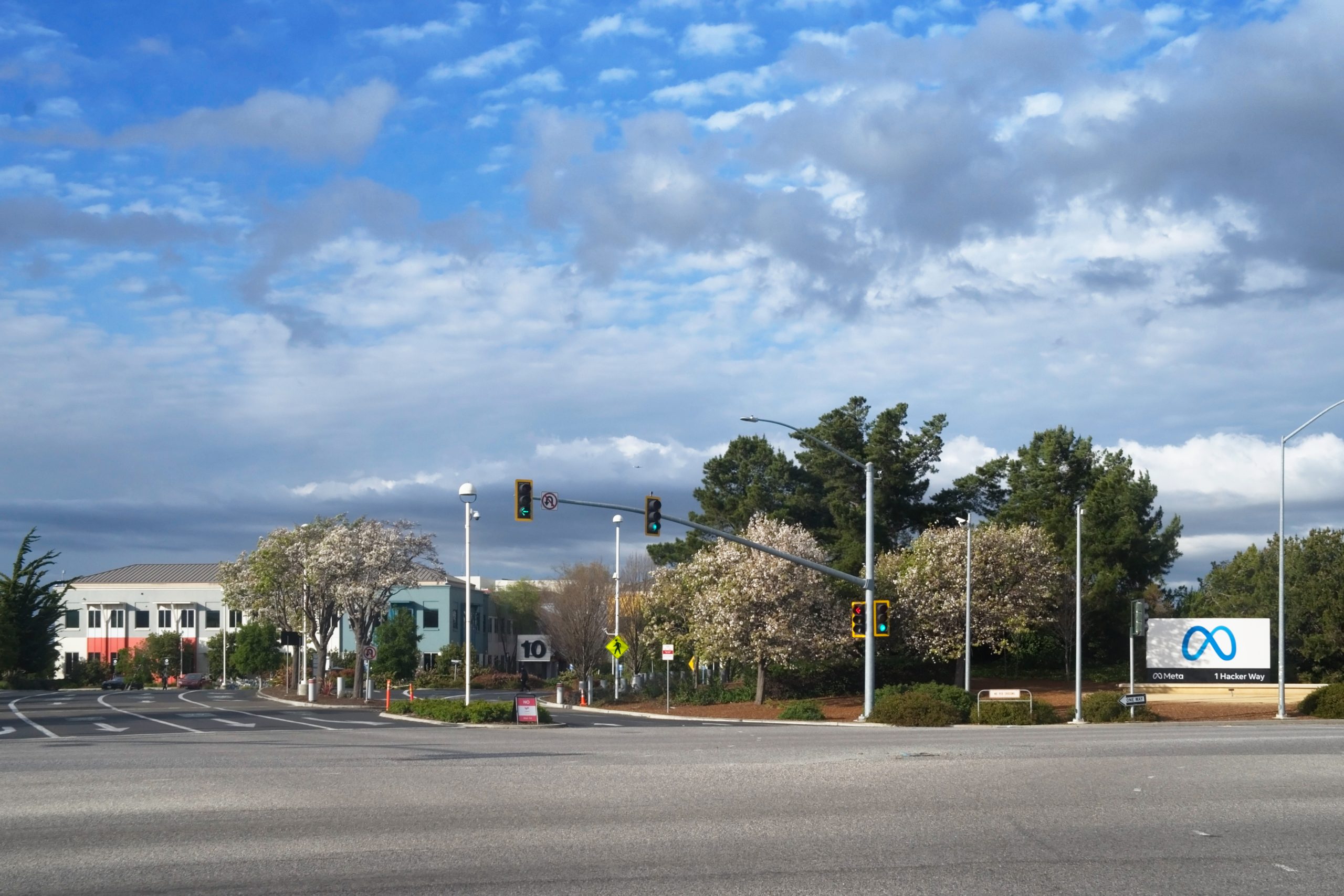 The Meta logo sign outside the company's headquarters at 1 Hacker Way in Menlo Park, California.