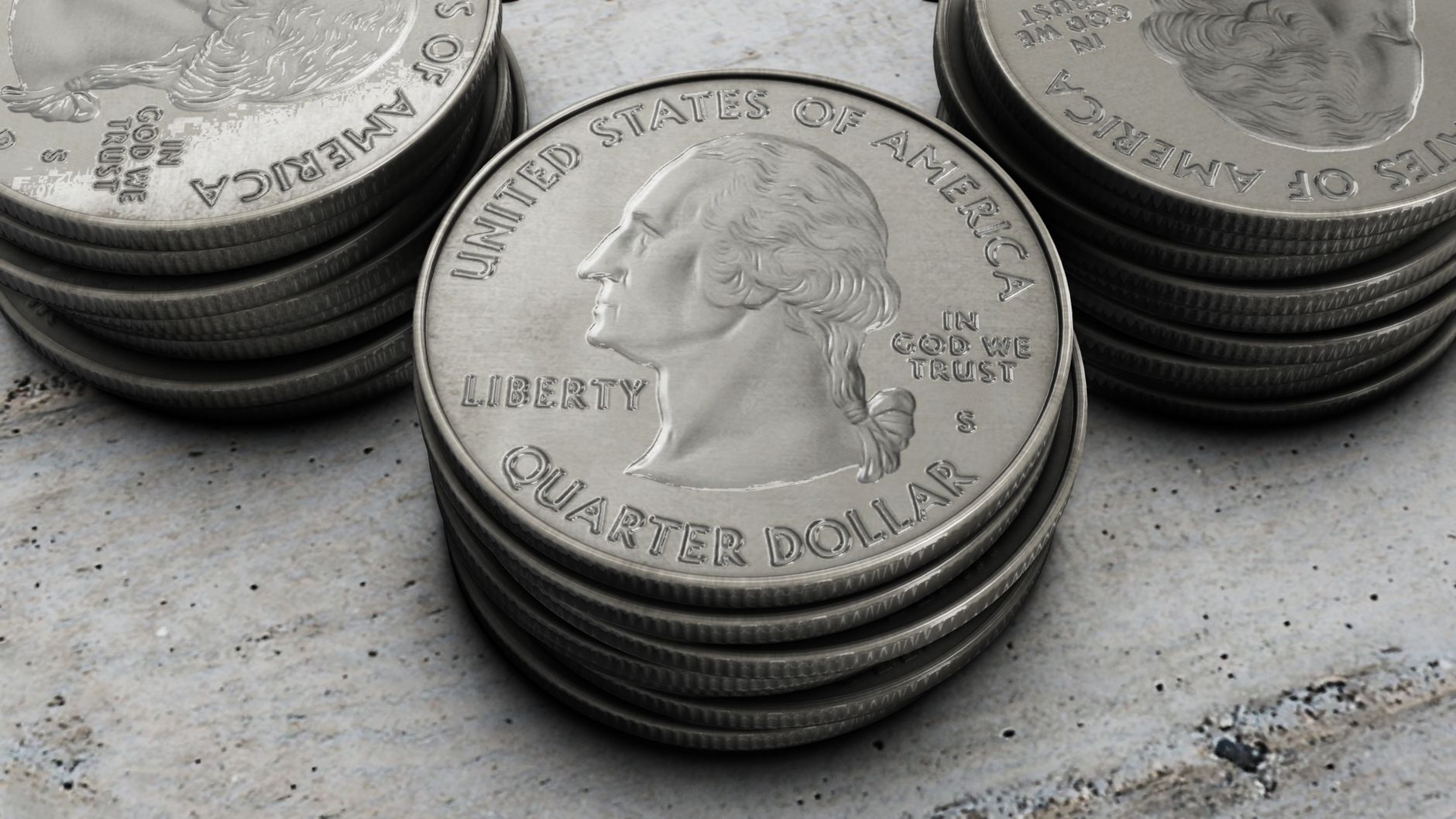 Stacks of quarter dollar coins on a concrete surface, representing Nvidia's quarterly earnings