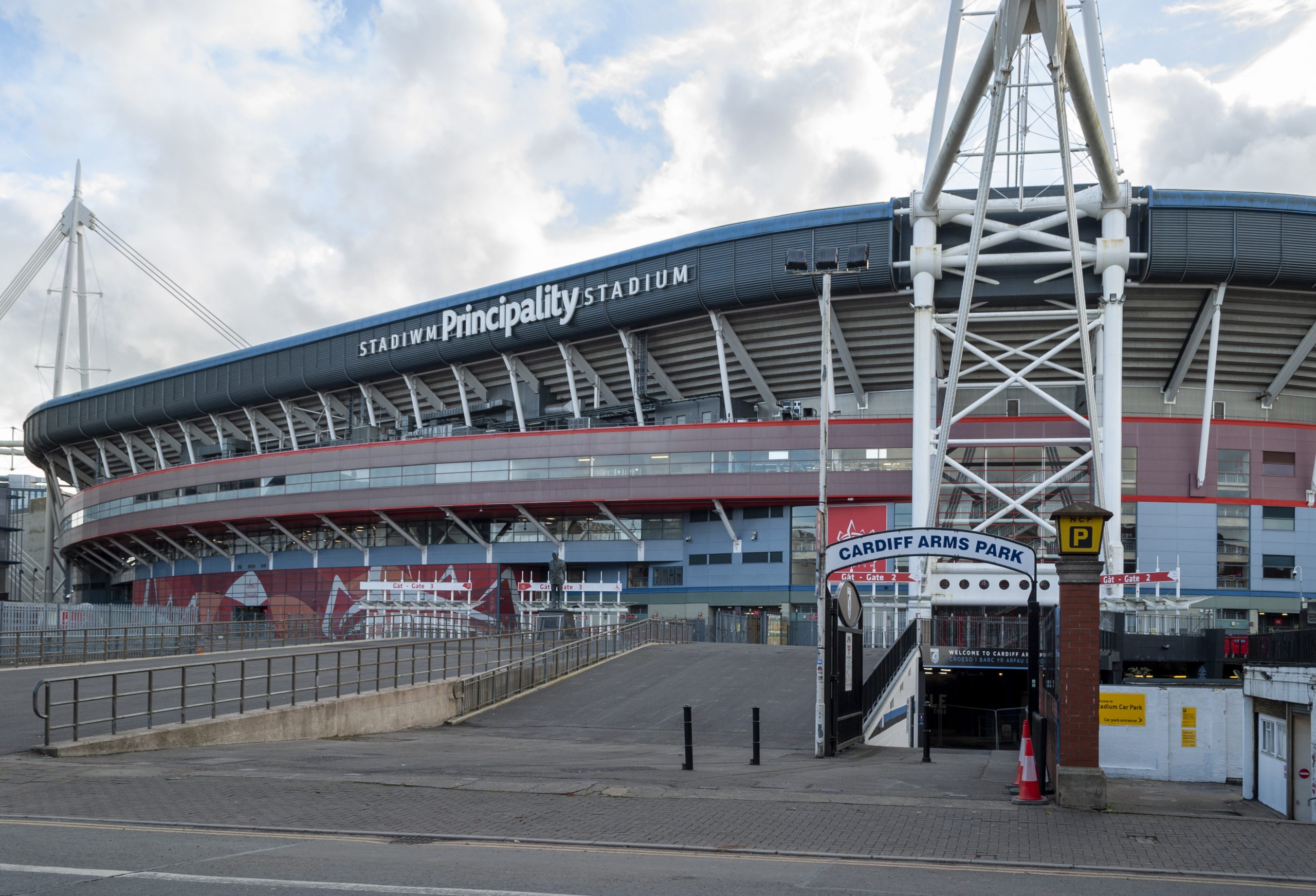 Exterior view of the Principality Stadium in Cardiff, Wales, showing its name on the roof canopy near Cardiff Arms Park
