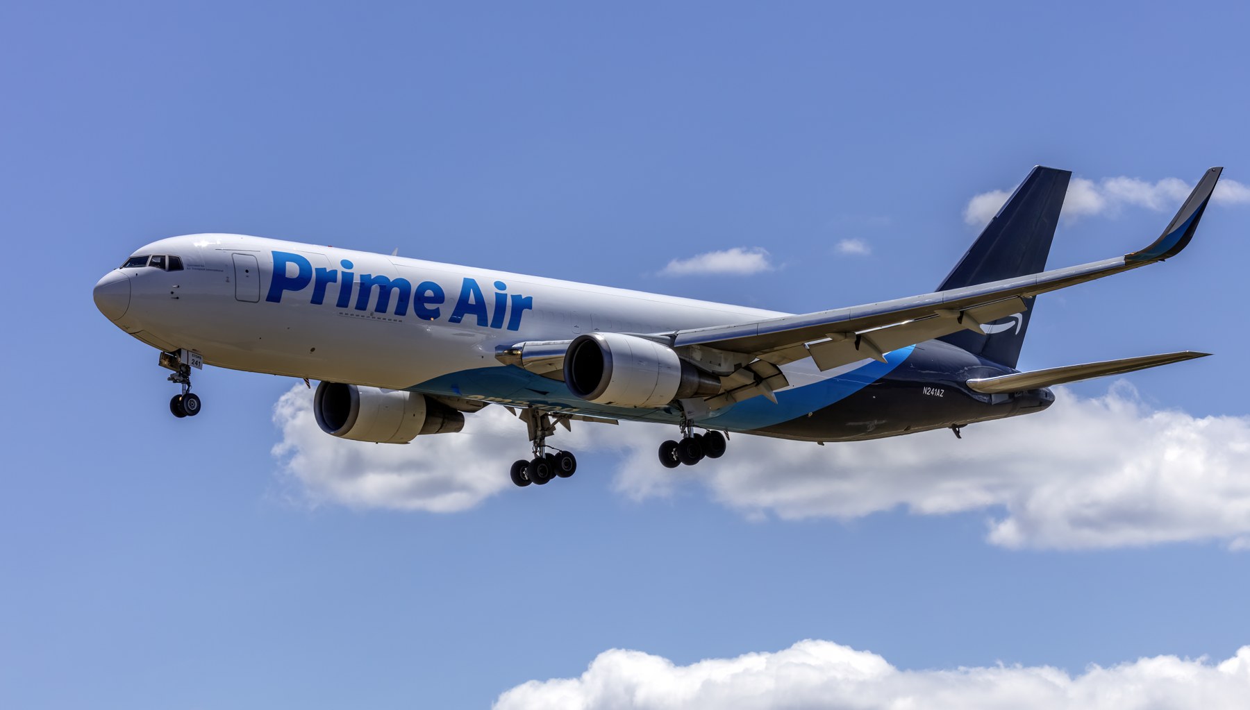An Amazon Prime Air Boeing 767-300 freighter on approach in clear weather