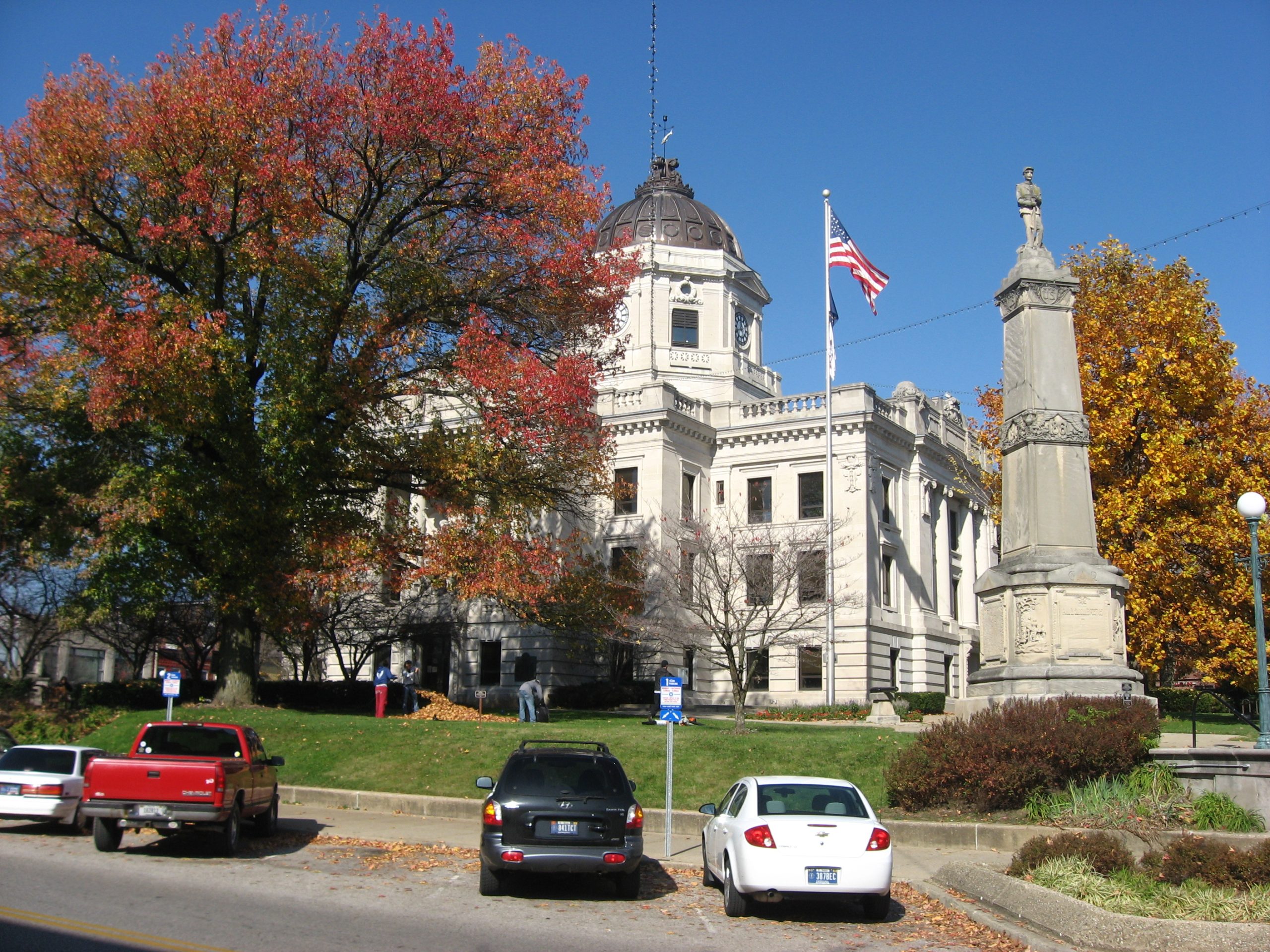 The domed Monroe County Courthouse in Bloomington, Indiana, seen from the street on an autumn day.