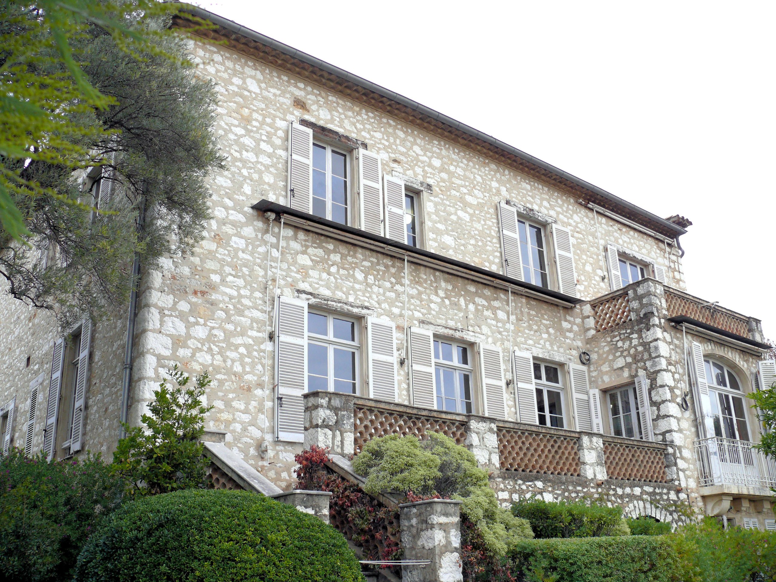 The stone facade of the Musee Renoir, Renoir's former house in Cagnes-sur-Mer, France